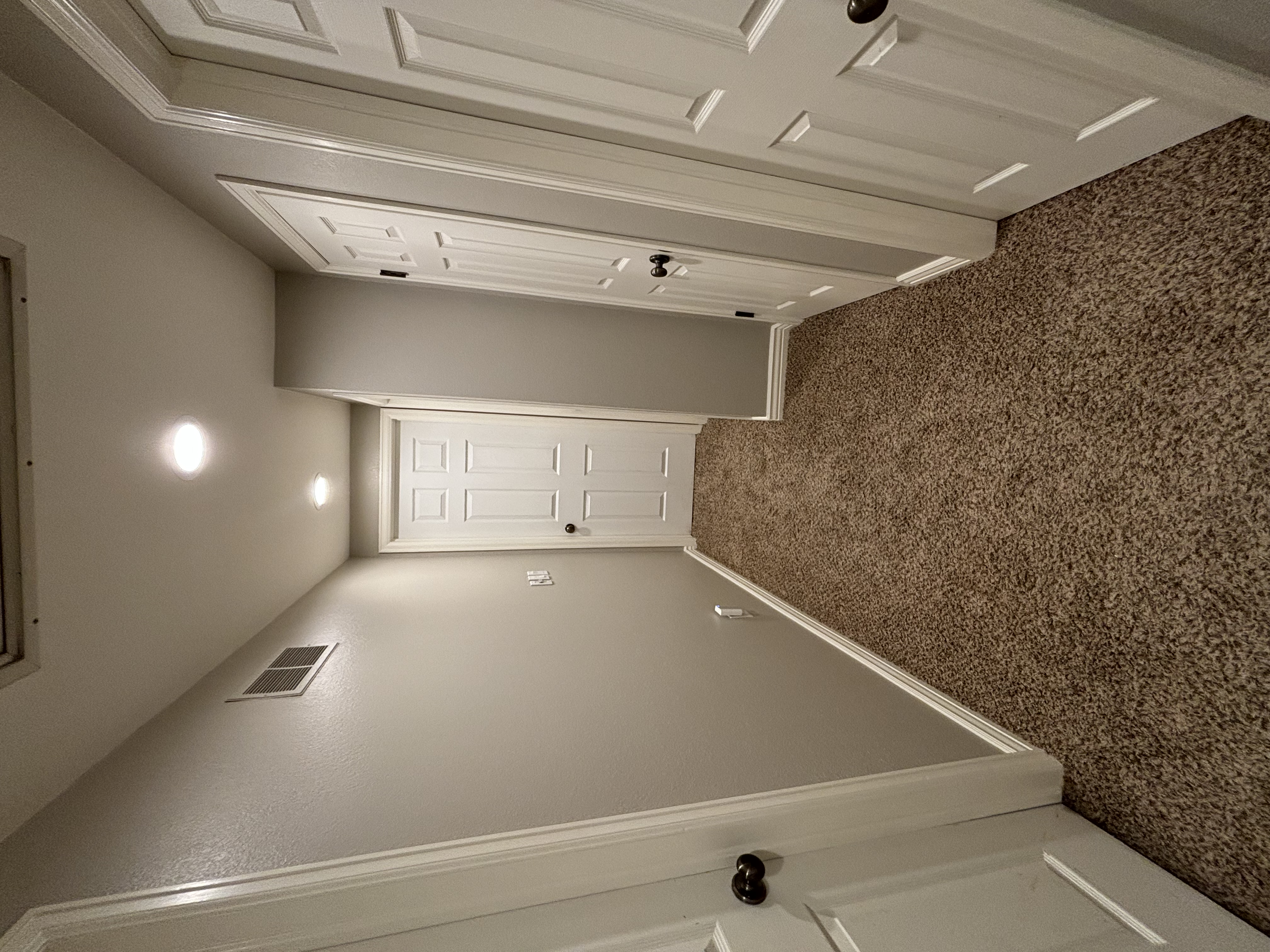 Finished hallway with painted walls and trim