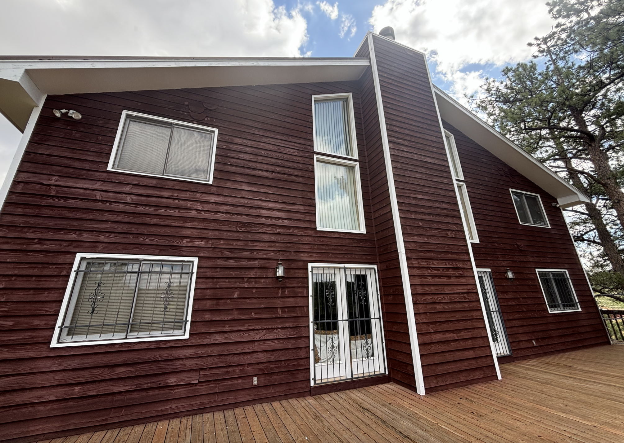 Exterior side view with updated siding color